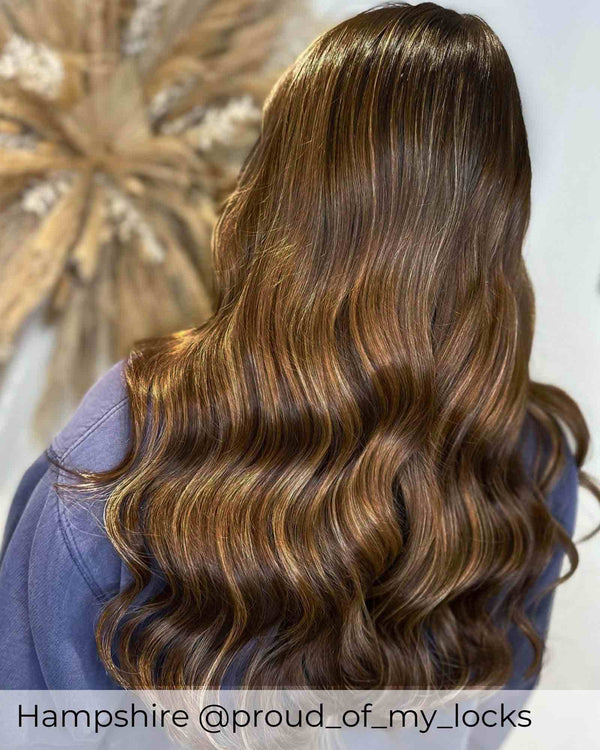 Balayage brown hair extensions with a blend of warm brown and chestnut brown highlighted human hair extensions by Viola